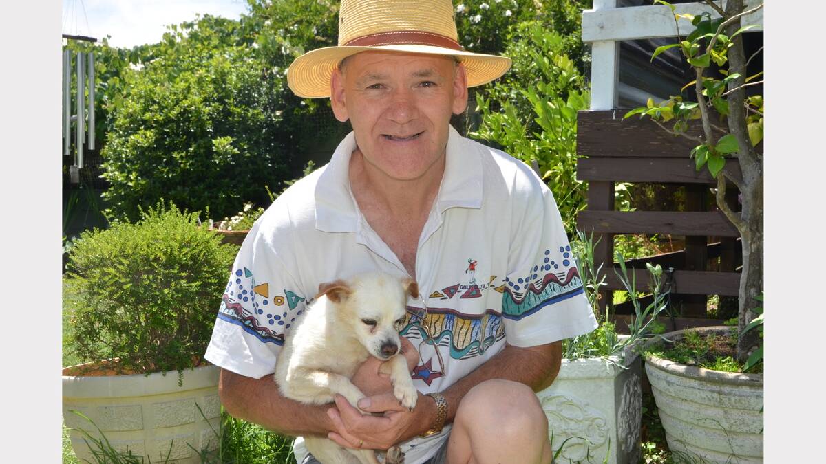NOT A LOAD OF POOP: Neville Moore is one of the volunteers who are part of the Pets of Older Persons Program.