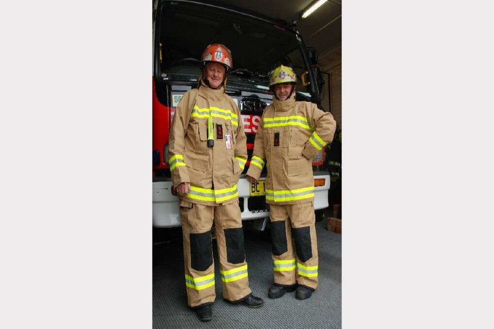 Glen Innes fire captain Earl Sharman and deputy captain Vince Davy model the latest in firefighting personal protection clothing. Photo:The Glen Innes Examiner. 