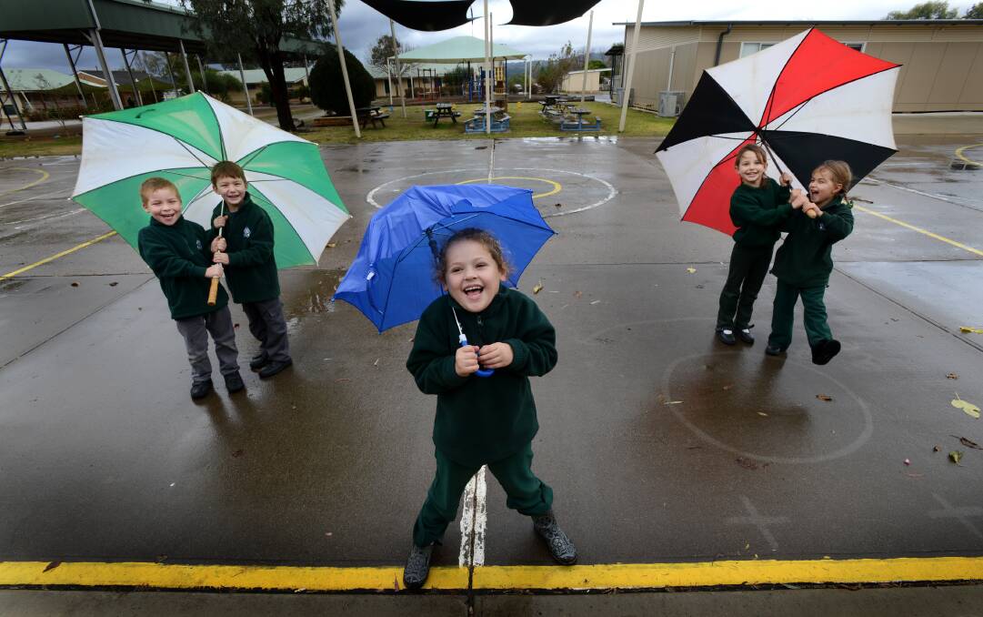 School children in Tamworth were ready for heavy rain on Wednesday. Photo:Barry Smith.