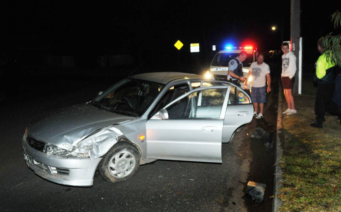 An allegedly stolen car which was crashed into a power pole in South Tamworth. Photo:Gareth Gardner - The Northern Daily Leader.