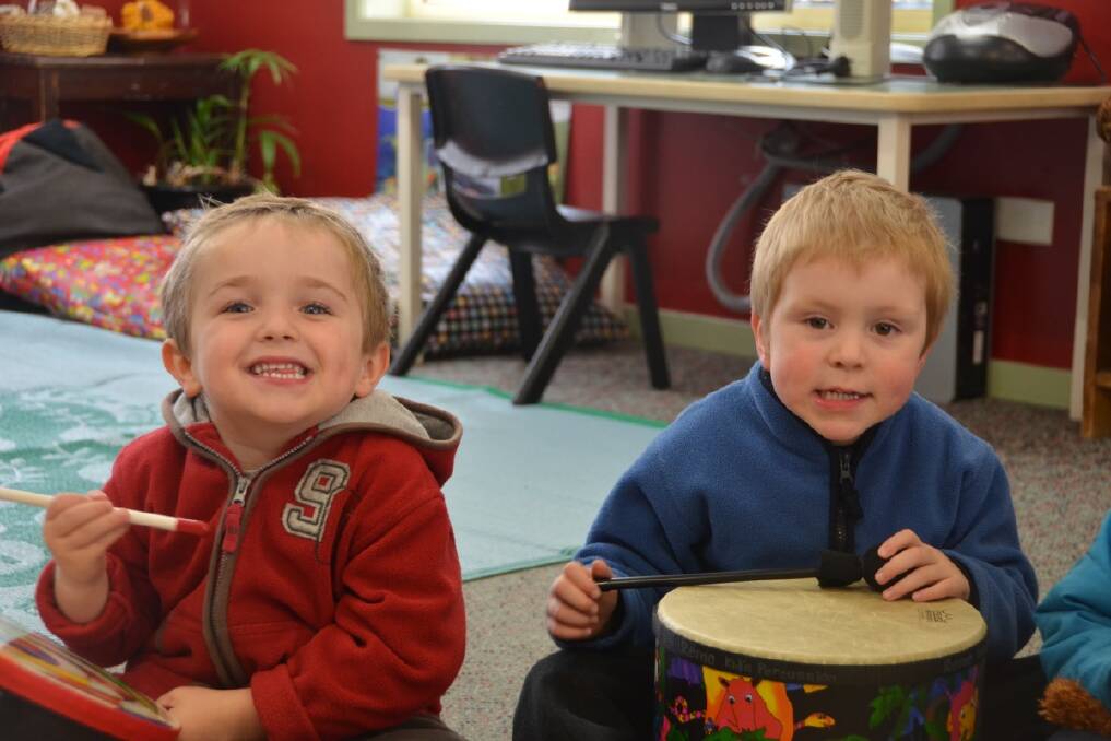 ALL SMILES: Lachlan Wanchers, left and Fletcher Toomey take part in a new program aimed at raising self esteeem atTony Town Childcare Centre. Photo:The Armidale Express. 