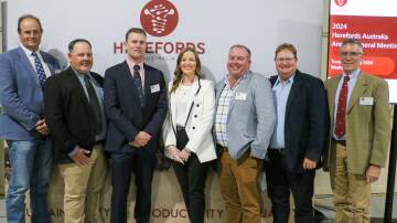 Michael Crowley, centre, is farewelled by the Herefords Australia board members
from left, Sam Broinowski, Ian Durkin, Annie Pumpa, Marc Greening, Mark Duthie and Mark Baker. Picture by Kim Woods
