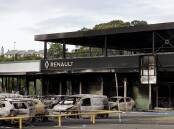 Riots in New Caledonia have resulted in burnt businesses, torched cars and looted shops. (AP PHOTO)